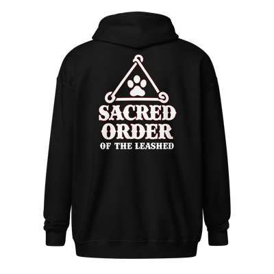 Zip-up hoodie with “Sacred Order of the Leashed” cult-style design featuring a mystical dog emblem—perfect for loyal pets and their humans