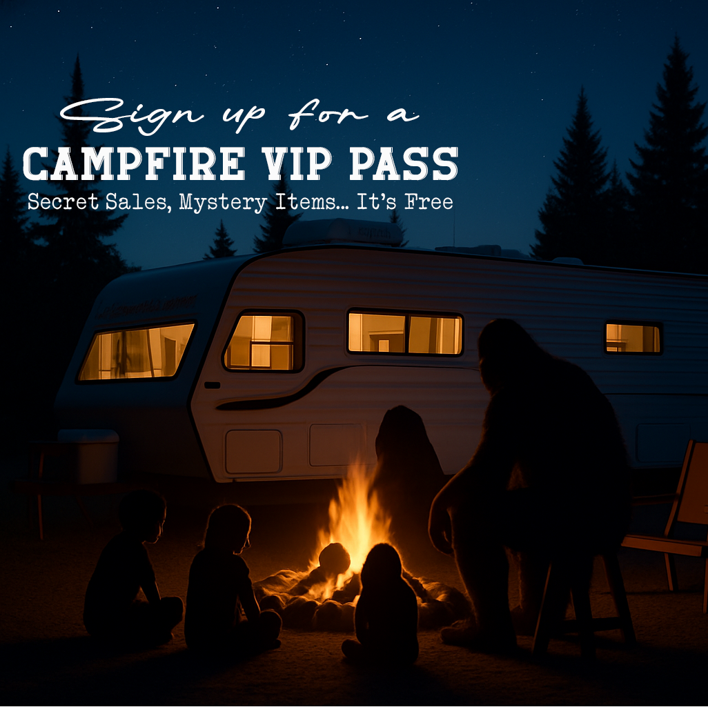 People gathered around a campfire in front of an RV at night with promotional text overlay.