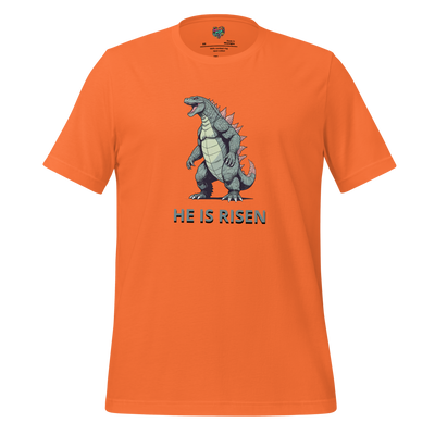 Funny Easter shirt featuring a Godzilla-style monster rising from the sea with bold text “He Is Risen” — irreverent design blending resurrection with giant monster chaos