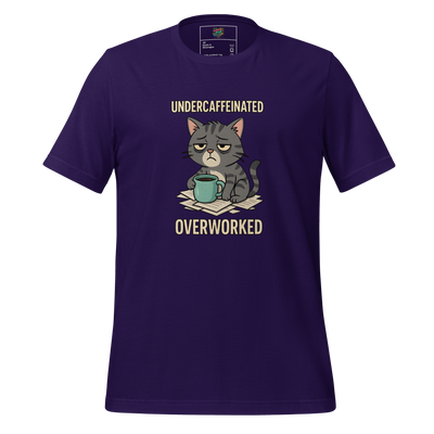 Funny work shirt featuring a slumped cat with droopy eyes and an empty mug, text reads “Undercaffeinated / Overworked” — perfect for tired professionals and office zombies